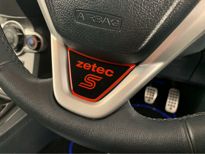 Load image into Gallery viewer, Fiesta Mk7 Mk7.5 Steering Wheel Lower Gel Badge - Zetec S Logo
