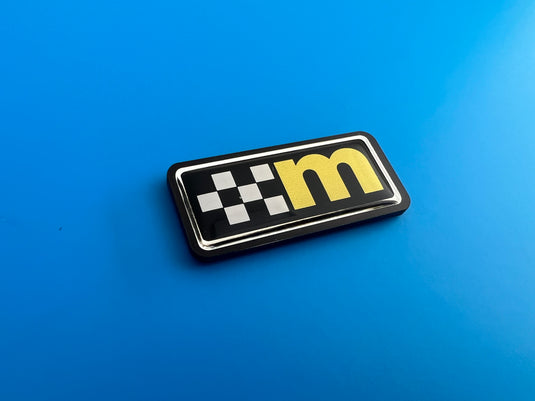 M Logo Gel Badges with Perspex Backing