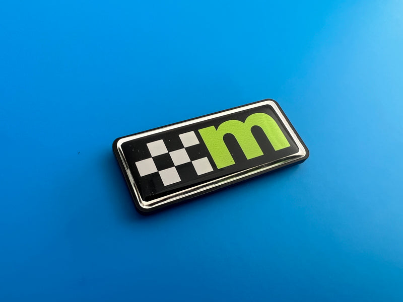 Load image into Gallery viewer, M Logo Gel Badges with Perspex Backing
